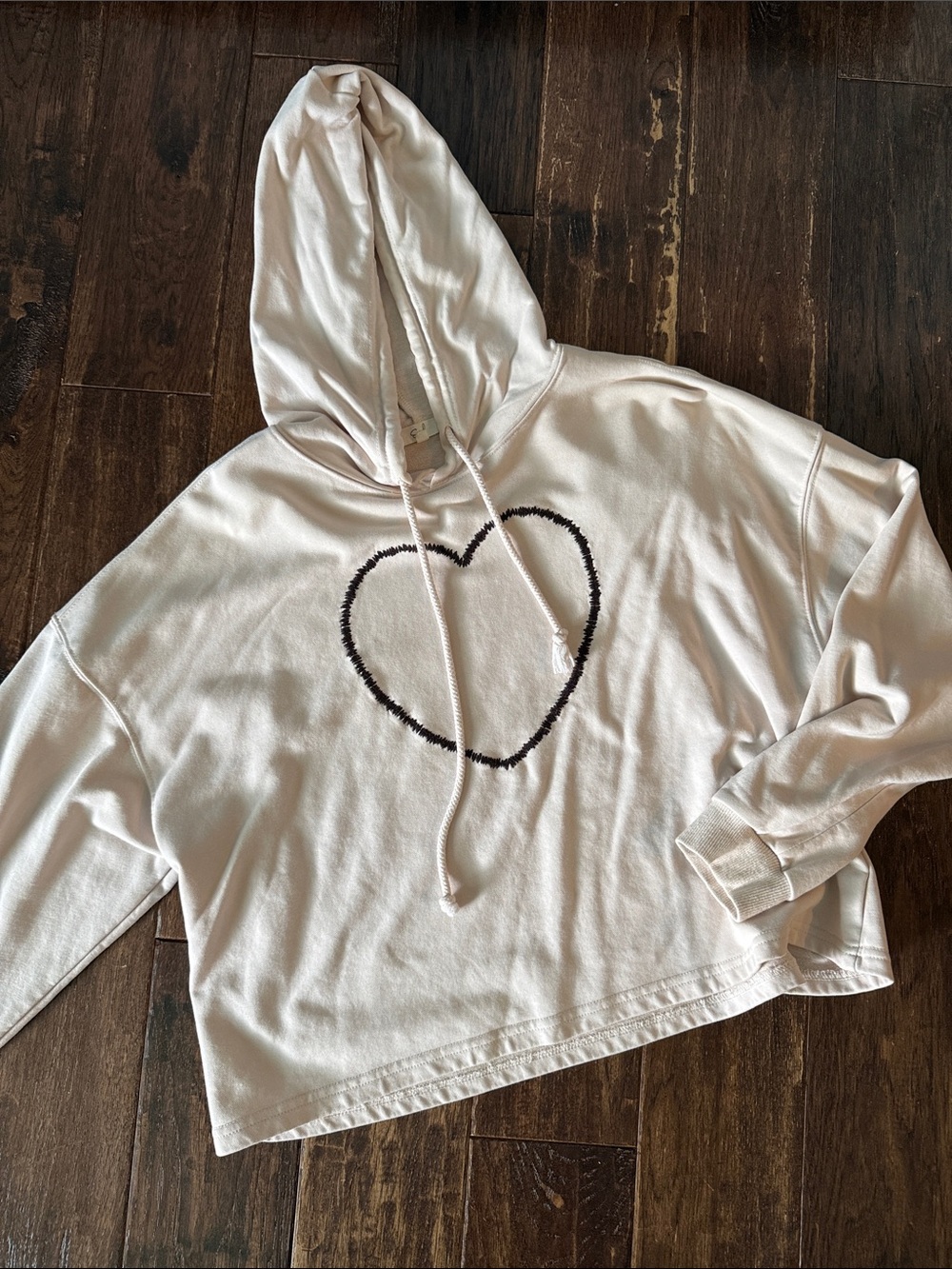 easel Cream Hoodie with Black Heart Graphic